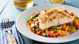 Dos de poisson blanc en croute de quinoa et noisettes accompagné de légumes du marché